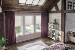 Skylights: 3/4" Single Cell SkyTrack??? Skylight Cellular Shades with Cordless Lift: Fanfare, Cosmic Light 0692Windows: 3/4" Single Cell Cellular Shades with Cordless Lift: Fanfare, Cosmic Light 0692Drapery: Pinch Pleat Drapery: Luminous, Majestic 2250  Hardware: 1 3/8" Opulence Wood Traverse Pole with Kirtling Finials: Regal Walnut 409